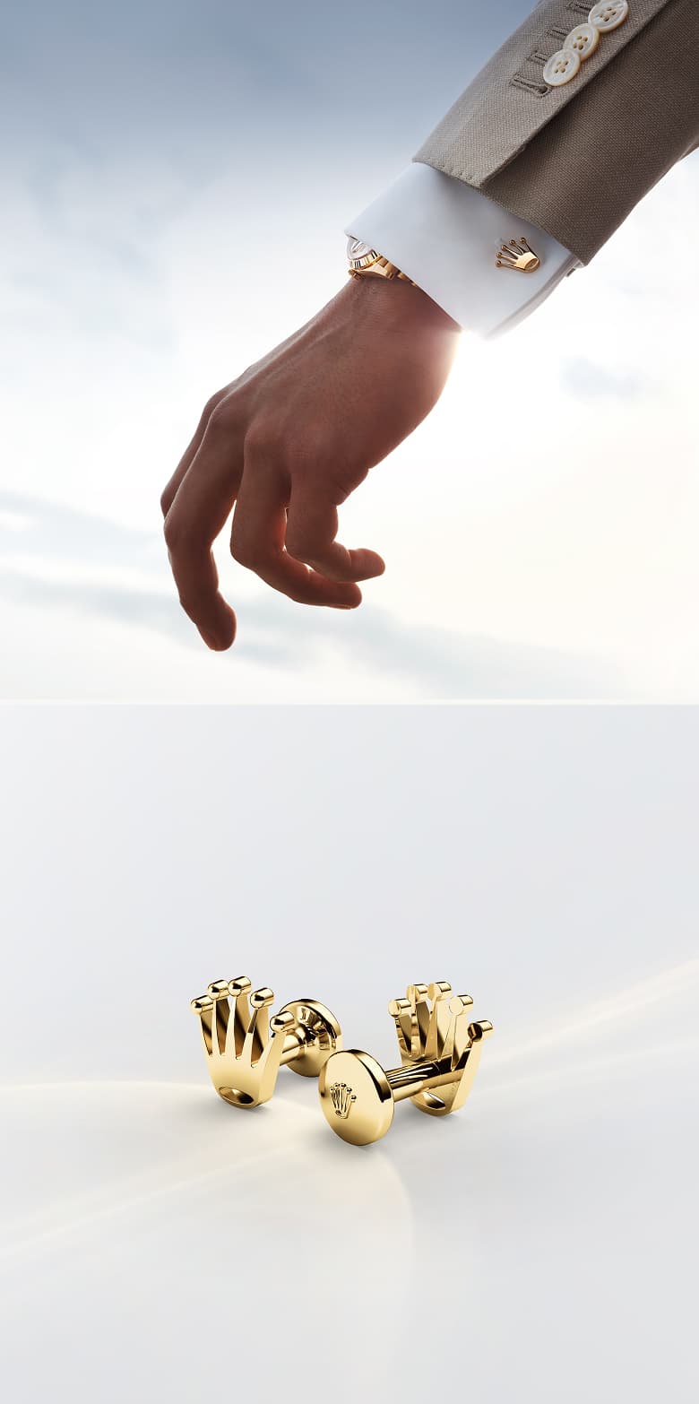 Rolex Accessories: Two images of Rolex 'Crown' cufflinks in 18 ct yellow gold. Above: modelled on a sleeve; Below: in close-up view. - Chang Ein Hong