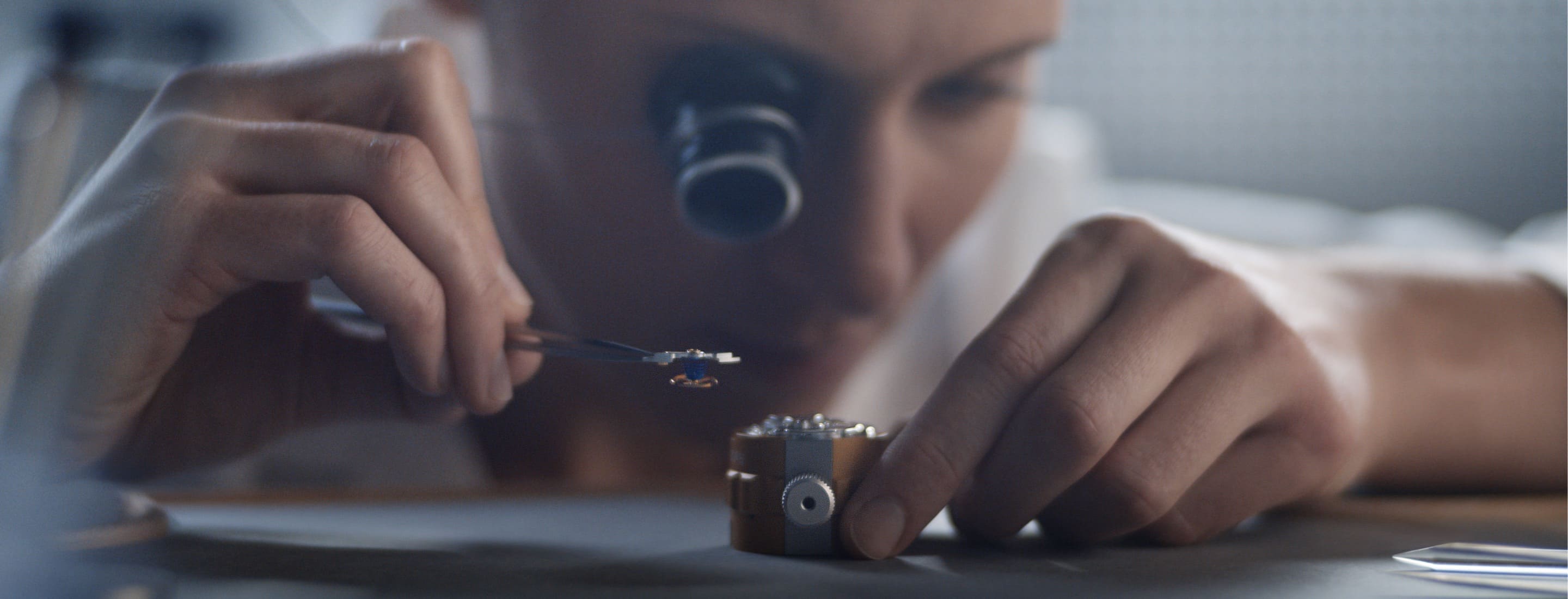 Watchmaker assembling a Rolex mechanical movement - Chang Ein Hong