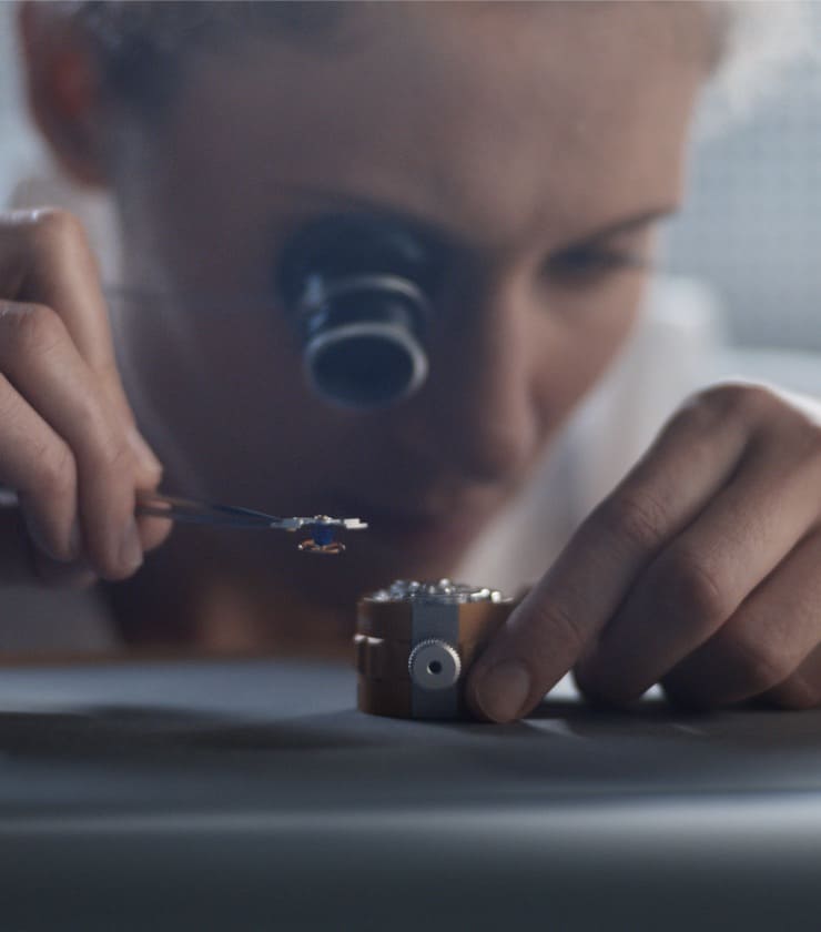 Watchmaker assembling a Rolex mechanical movement - Chang Ein Hong
