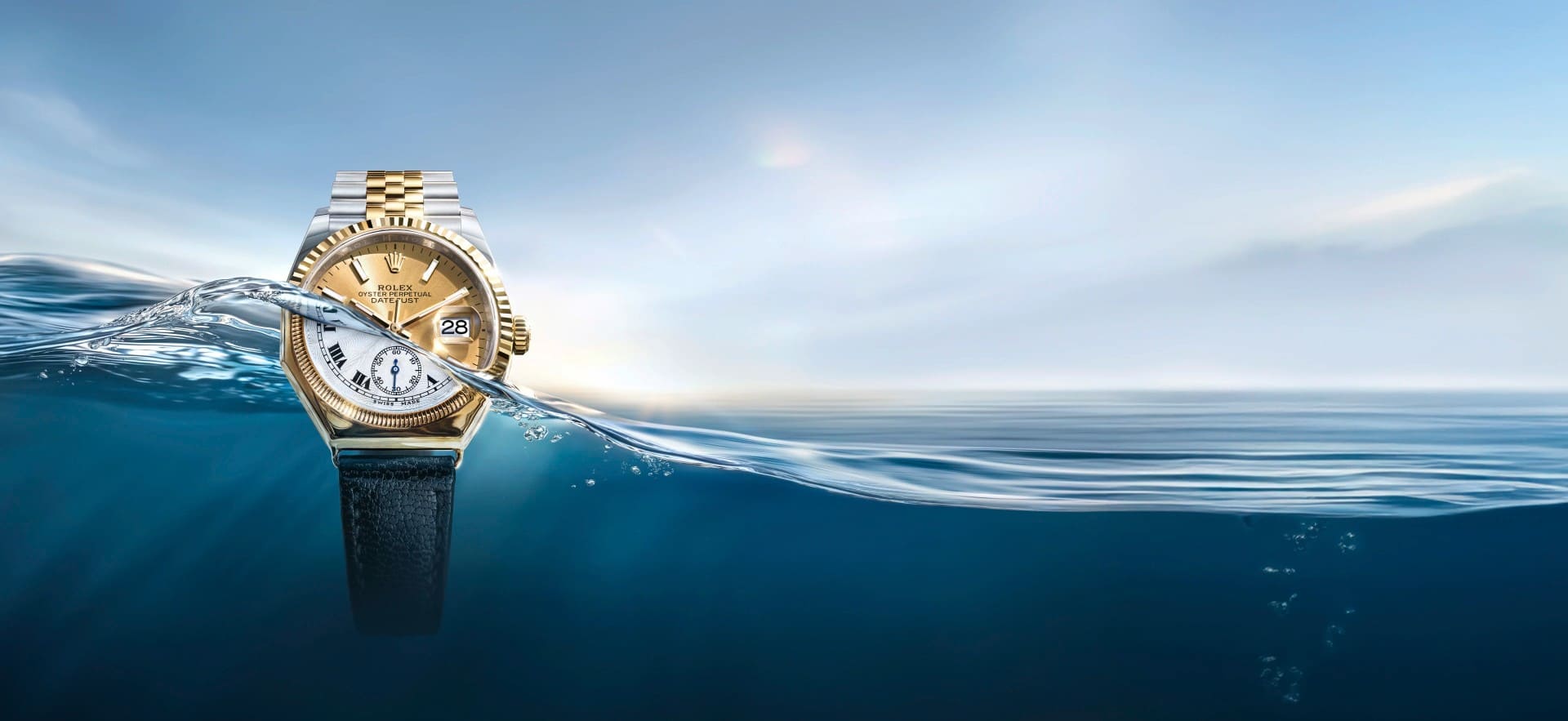 Rolex Datejust displayed beside the first Oyster octagonal watch from 1926 - Chang Ein Hong