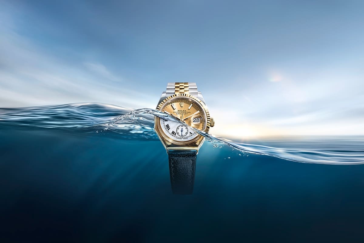 Rolex Datejust displayed beside the first Oyster octagonal watch from 1926 - Chang Ein Hong