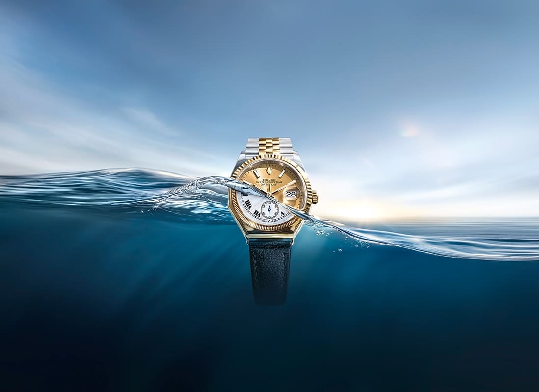 Rolex Datejust displayed beside the first Oyster octagonal watch from 1926 - Chang Ein Hong