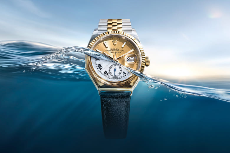 Rolex Datejust displayed beside the first Oyster octagonal watch from 1926 - Chang Ein Hong