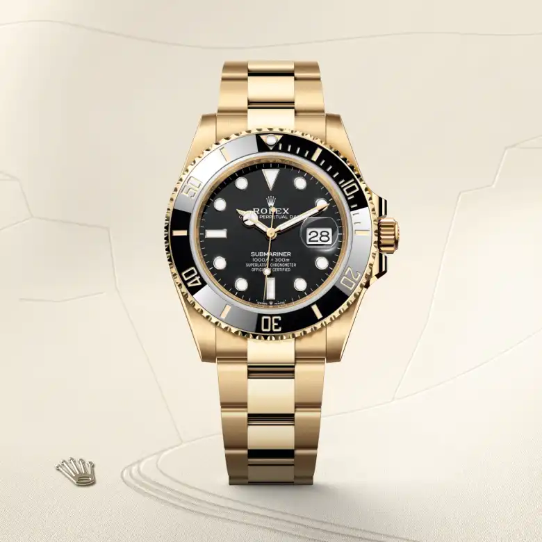 The The Rolex Submariner Date in yellow gold shown against a muted, elegant background. - Chang Ein Hong