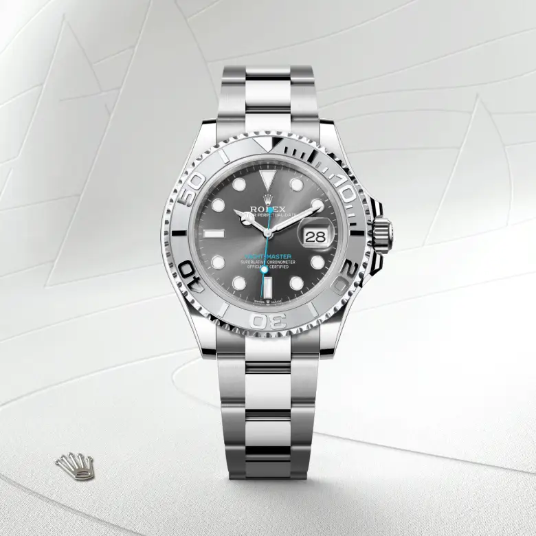The The Rolex Yacht-Master 40 in Oystersteel and platinum shown against a muted, elegant background. - Chang Ein Hong