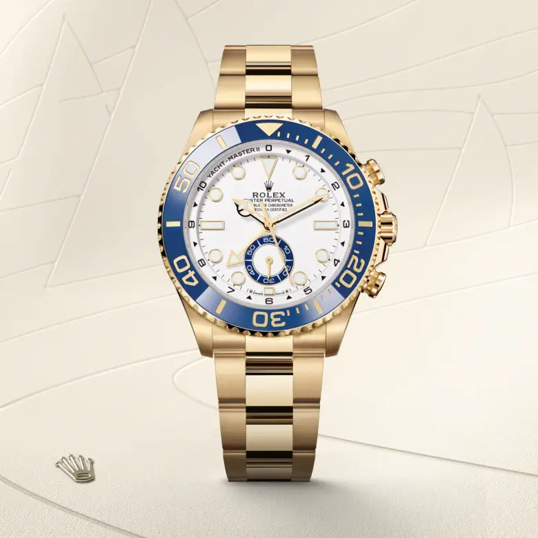 The The Rolex Yacht-Master II in yellow gold shown against a muted, elegant background. - Chang Ein Hong
