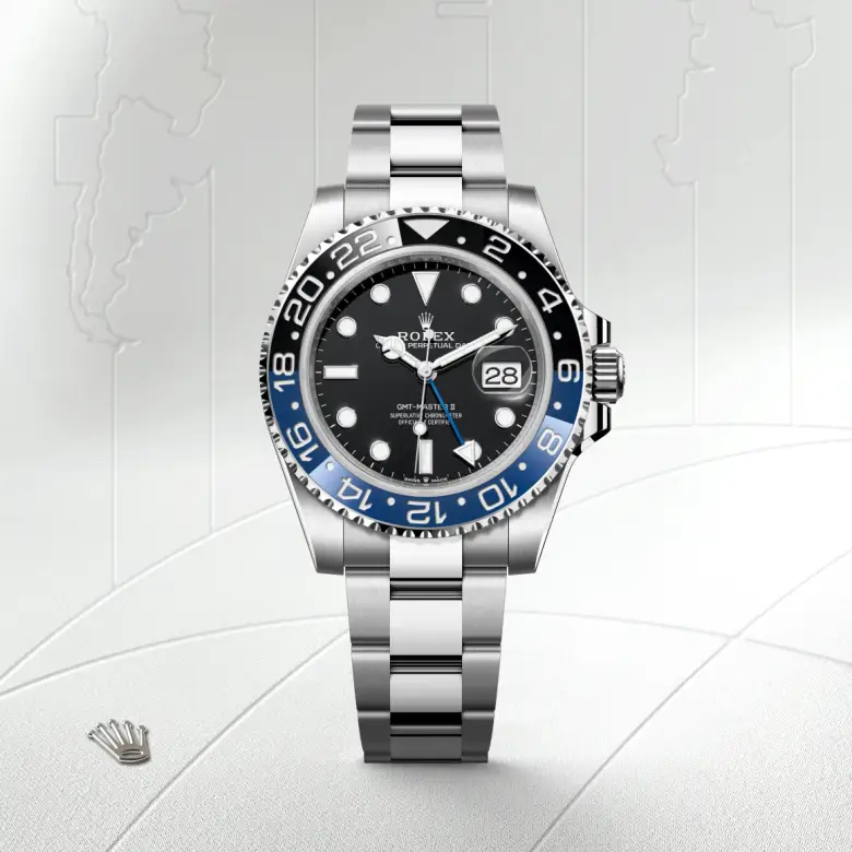 The The Rolex GMT-Master II in Oystersteel shown against a muted, elegant background. - Chang Ein Hong