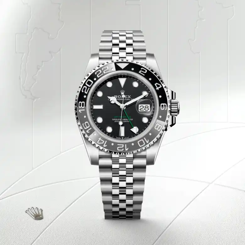 The The Rolex GMT-Master II in Oystersteel shown against a muted, elegant background. - Chang Ein Hong