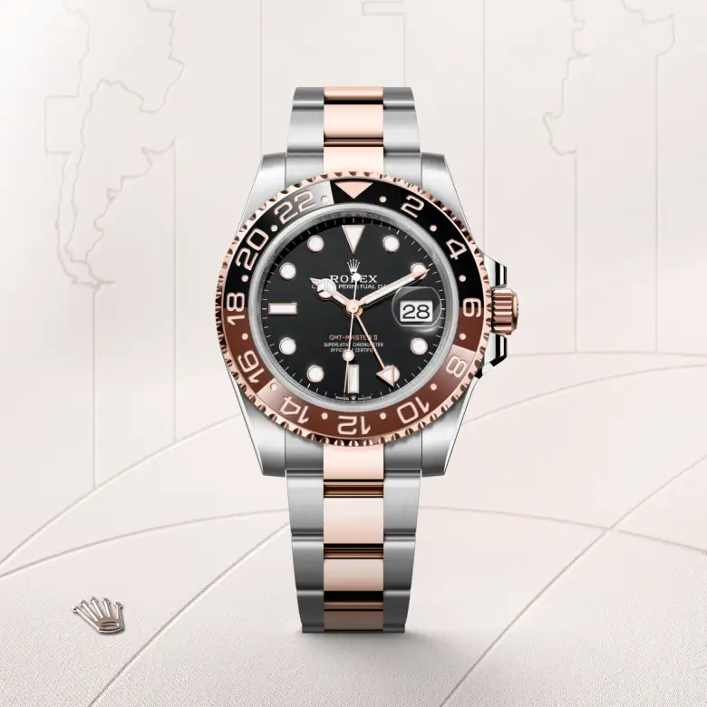 The The Rolex GMT-Master II in Oystersteel and Everose gold shown against a muted, elegant background. - Chang Ein Hong