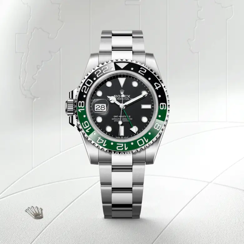 The The Rolex GMT-Master II in Oystersteel shown against a muted, elegant background. - Chang Ein Hong