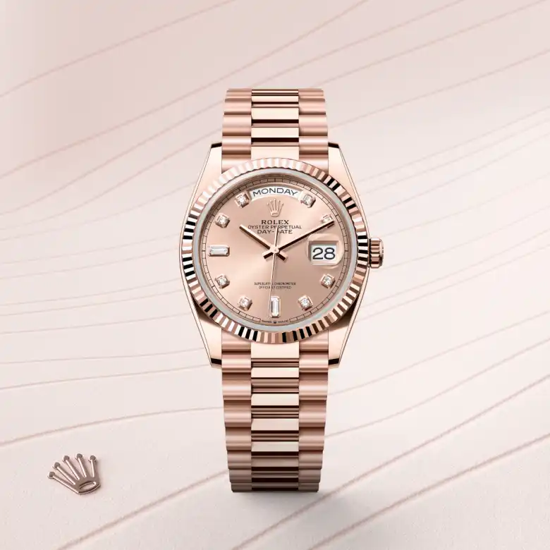 The The Rolex Day-Date 36 in Everose gold shown against a muted, elegant background. - Chang Ein Hong