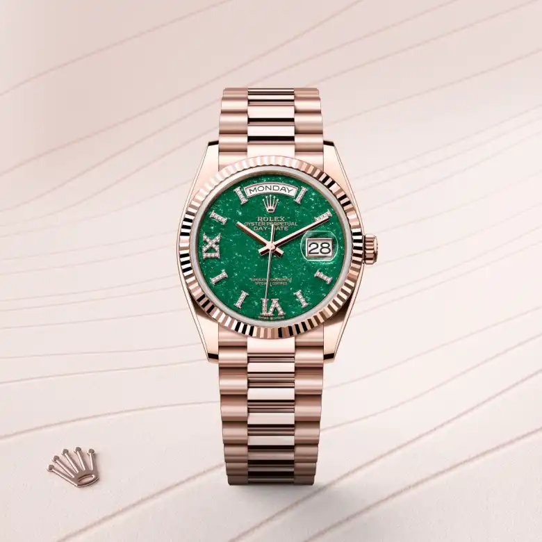 The The Rolex Day-Date 36 in Everose gold shown against a muted, elegant background. - Chang Ein Hong