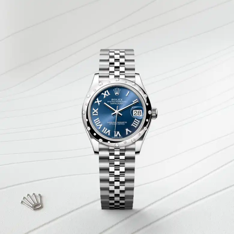 The The Rolex Datejust 31 in Oystersteel, white gold and diamonds shown against a muted, elegant background. - Chang Ein Hong
