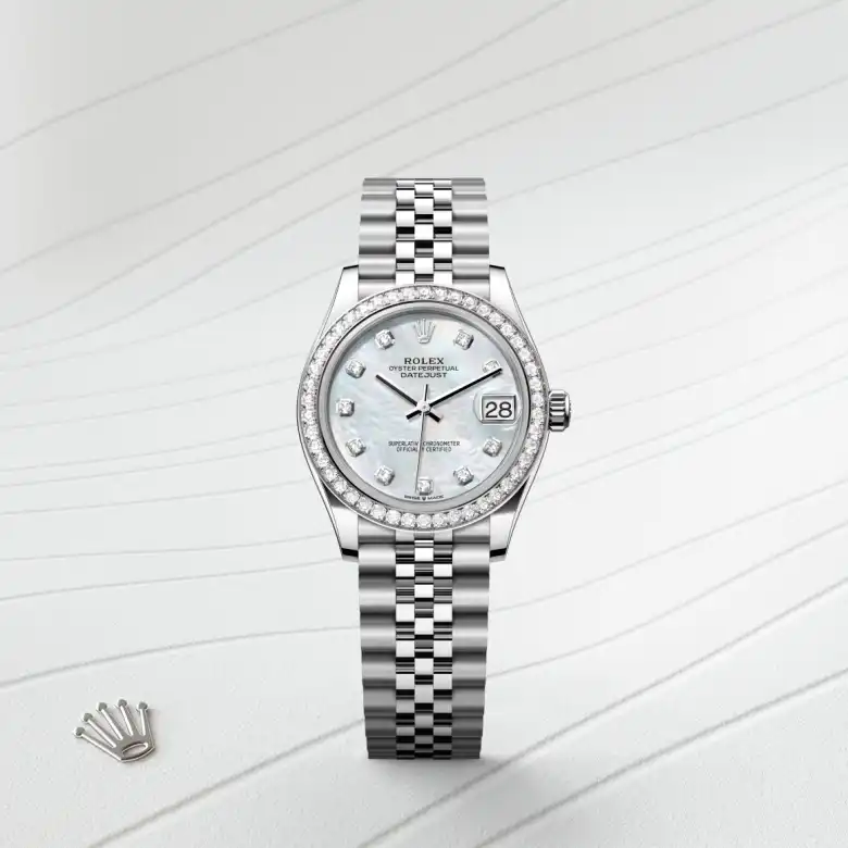 The The Rolex Datejust 31 in Oystersteel, white gold and diamonds shown against a muted, elegant background. - Chang Ein Hong