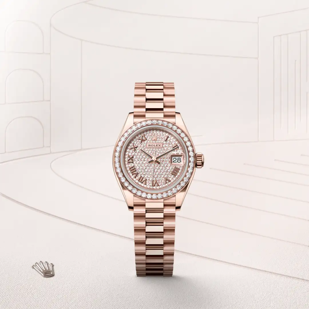 The The Rolex Lady-Datejust in Everose gold and diamonds shown against a muted, elegant background. - Chang Ein Hong