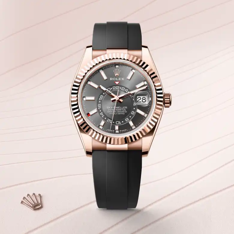 The The Rolex Sky-Dweller in Everose gold shown against a muted, elegant background. - Chang Ein Hong