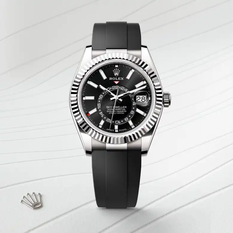 The The Rolex Sky-Dweller in white gold shown against a muted, elegant background. - Chang Ein Hong