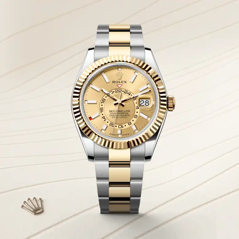 The The Rolex Sky-Dweller in Oystersteel and yellow gold shown against a muted, elegant background. - Chang Ein Hong