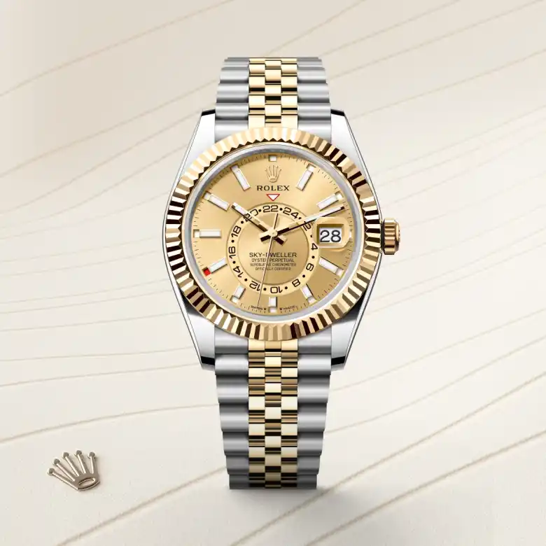 The The Rolex Sky-Dweller in Oystersteel and yellow gold shown against a muted, elegant background. - Chang Ein Hong
