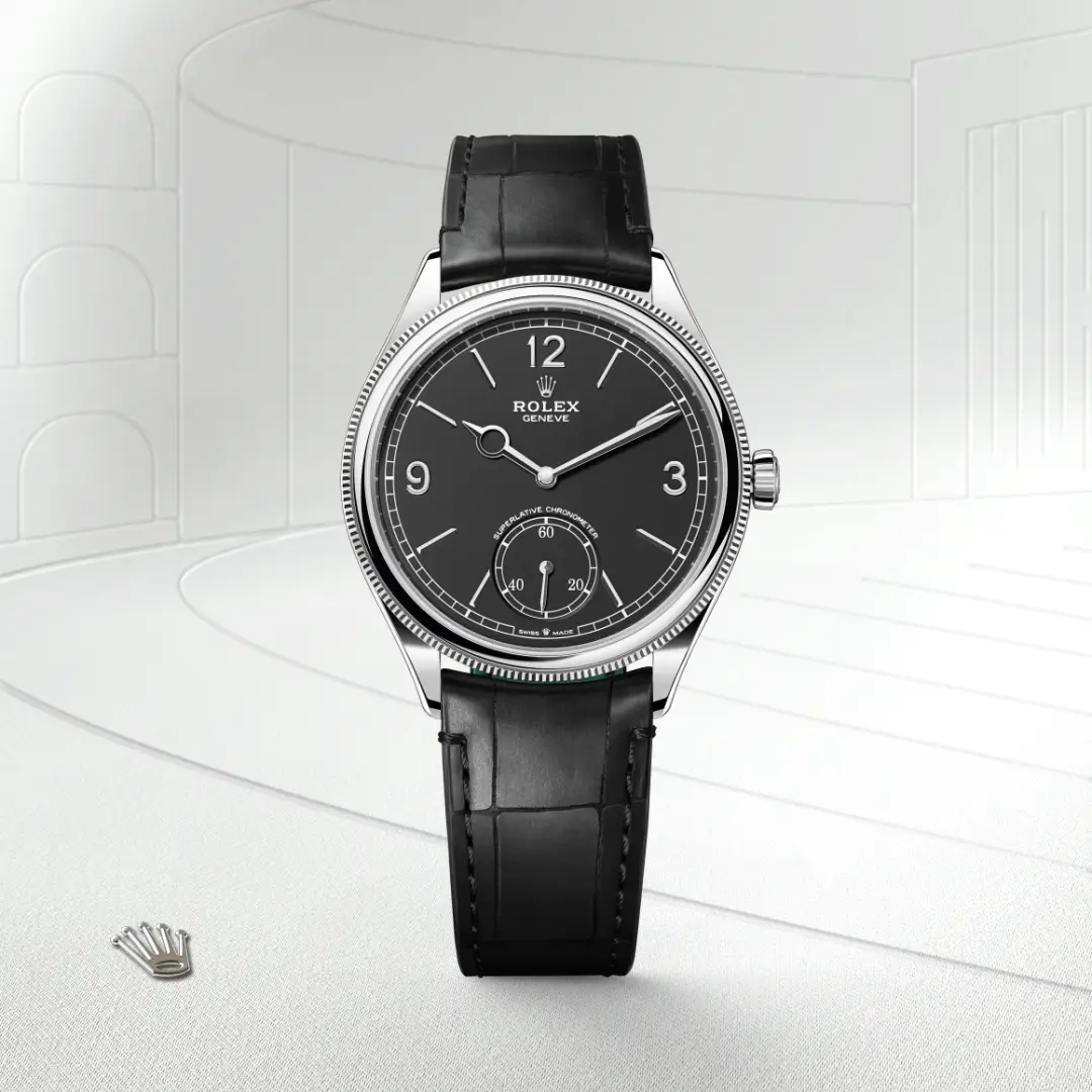 The The Rolex 1908 in 18 ct white gold, polished finish shown against a muted, elegant background. - Chang Ein Hong