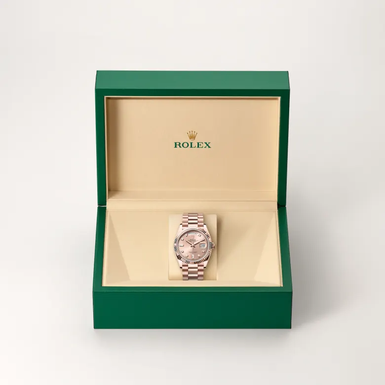The The Rolex Day-Date 36 in Everose gold in the Rolex presentation box. - Chang Ein Hong
