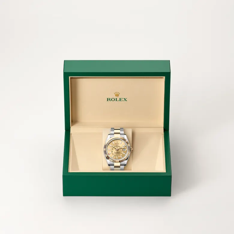 The The Rolex Sky-Dweller in Oystersteel and yellow gold in the Rolex presentation box. - Chang Ein Hong