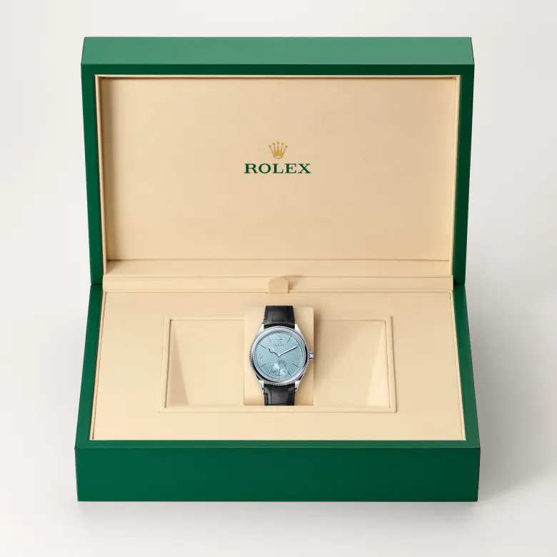The The Rolex 1908 in platinum, polished finish in the Rolex presentation box. - Chang Ein Hong