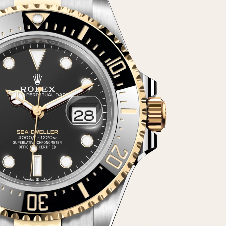 A close-up view of the The Rolex Sea-Dweller in Oystersteel and yellow gold. - Chang Ein Hong