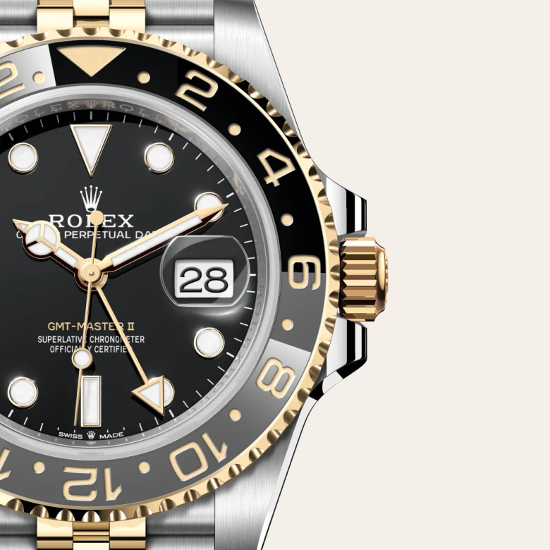A close-up view of the The Rolex GMT-Master II in Oystersteel and yellow gold. - Chang Ein Hong