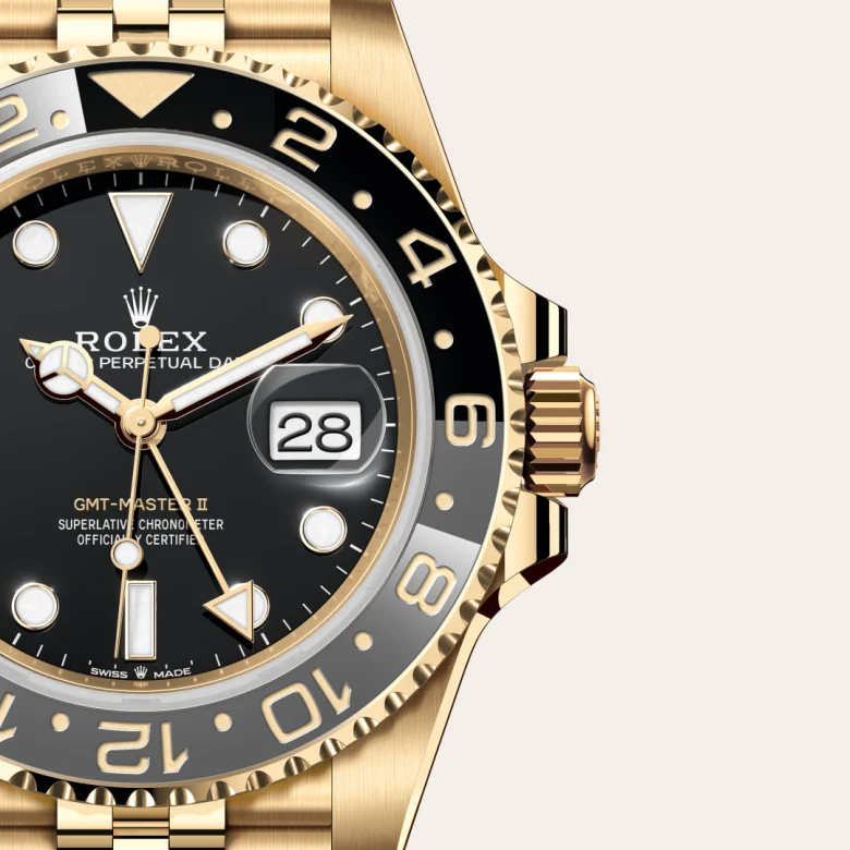A close-up view of the The Rolex GMT-Master II in yellow gold. - Chang Ein Hong