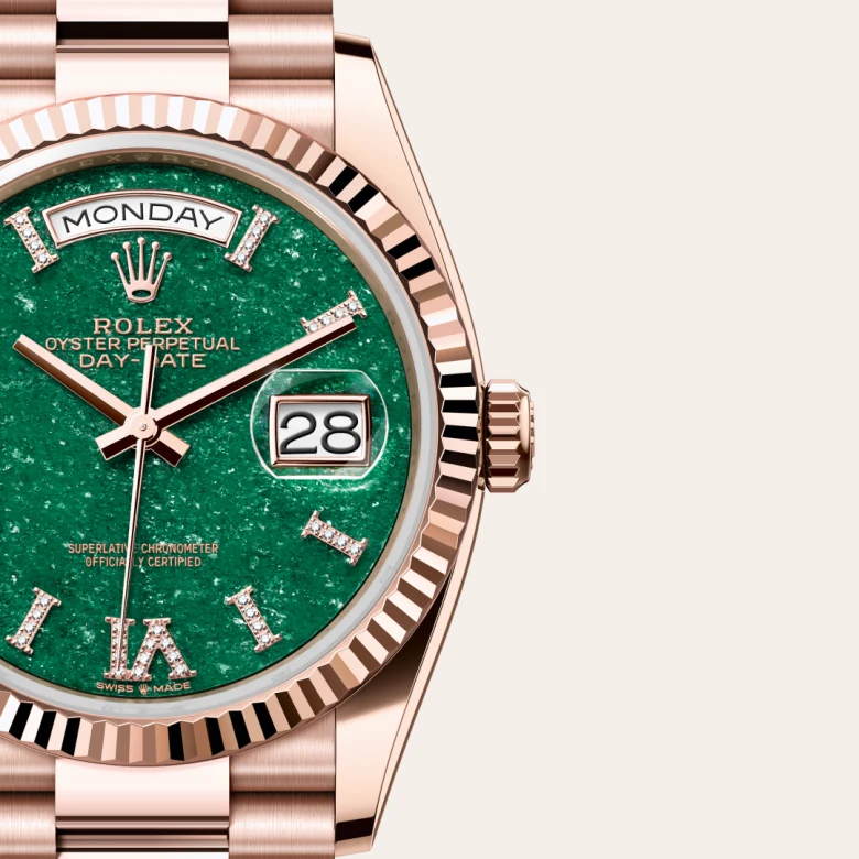 A close-up view of the The Rolex Day-Date 36 in Everose gold. - Chang Ein Hong