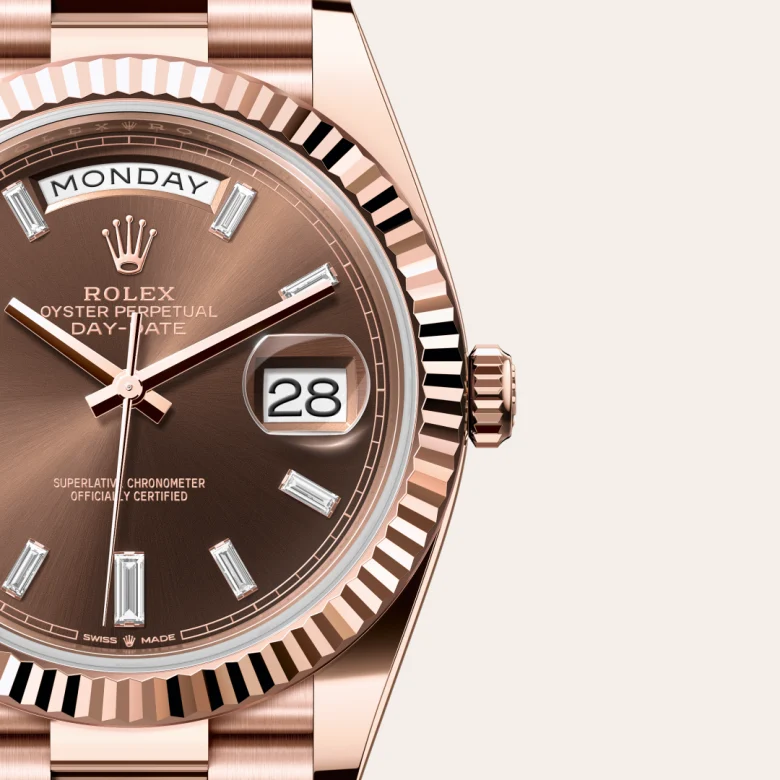 A close-up view of the The Rolex Day-Date 40 in Everose gold. - Chang Ein Hong