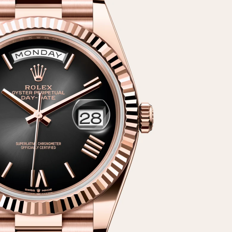 A close-up view of the The Rolex Day-Date 40 in Everose gold. - Chang Ein Hong
