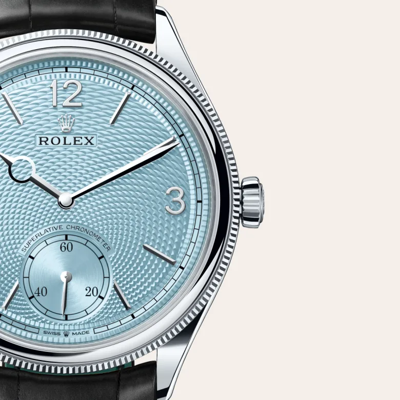 A close-up view of the The Rolex 1908 in platinum, polished finish. - Chang Ein Hong