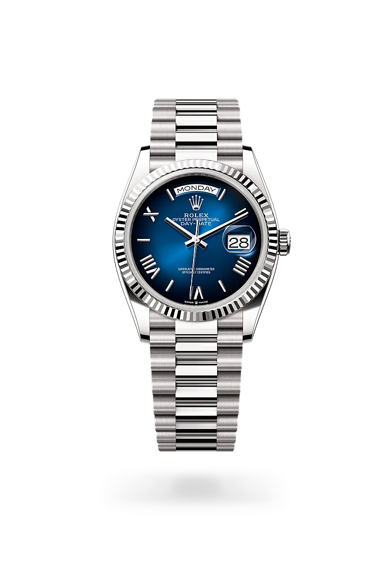 Rolex Day-Date 36 in 18ct white gold with fluted bezel, blue ombre lacquer dial with Roman numeral hour markers, day and date displays, and President bracelet. - Chang Ein Hong