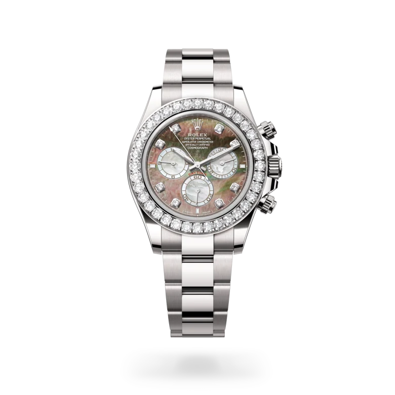 Rolex Cosmograph Daytona in 18ct white gold with diamond-set bezel, black and white mother-of-pearl chronograph dial set with diamonds, and Oyster bracelet. - Chang Ein Hong