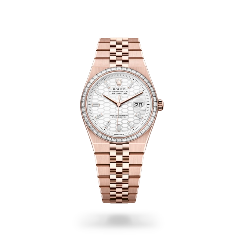 Rolex Land-Dweller in 18 ct Everose gold with white honeycomb motif dial, Arabic numeral markers, baguette diamond-set bezel and Jubilee bracelet - Chang Ein Hong