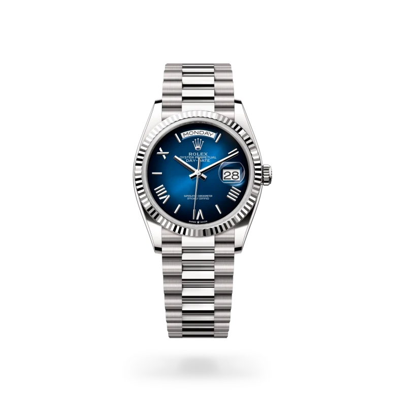 Rolex Day-Date 36 in 18ct white gold with fluted bezel, blue ombre lacquer dial with Roman numeral hour markers, day and date displays, and President bracelet. - Chang Ein Hong