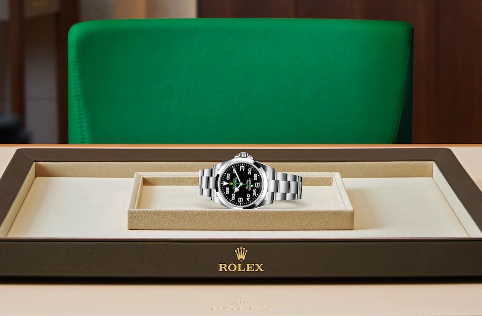 Rolex watch on tray landscape